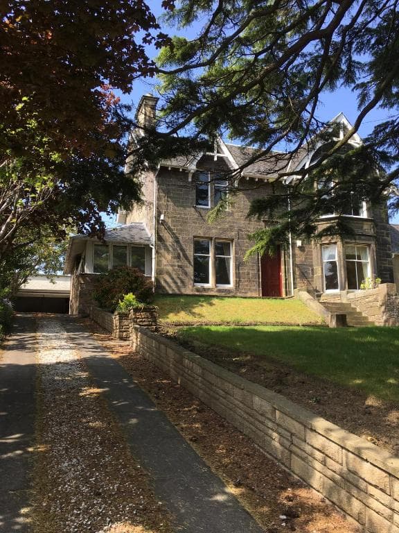 Detached stone villa with landscaped garden